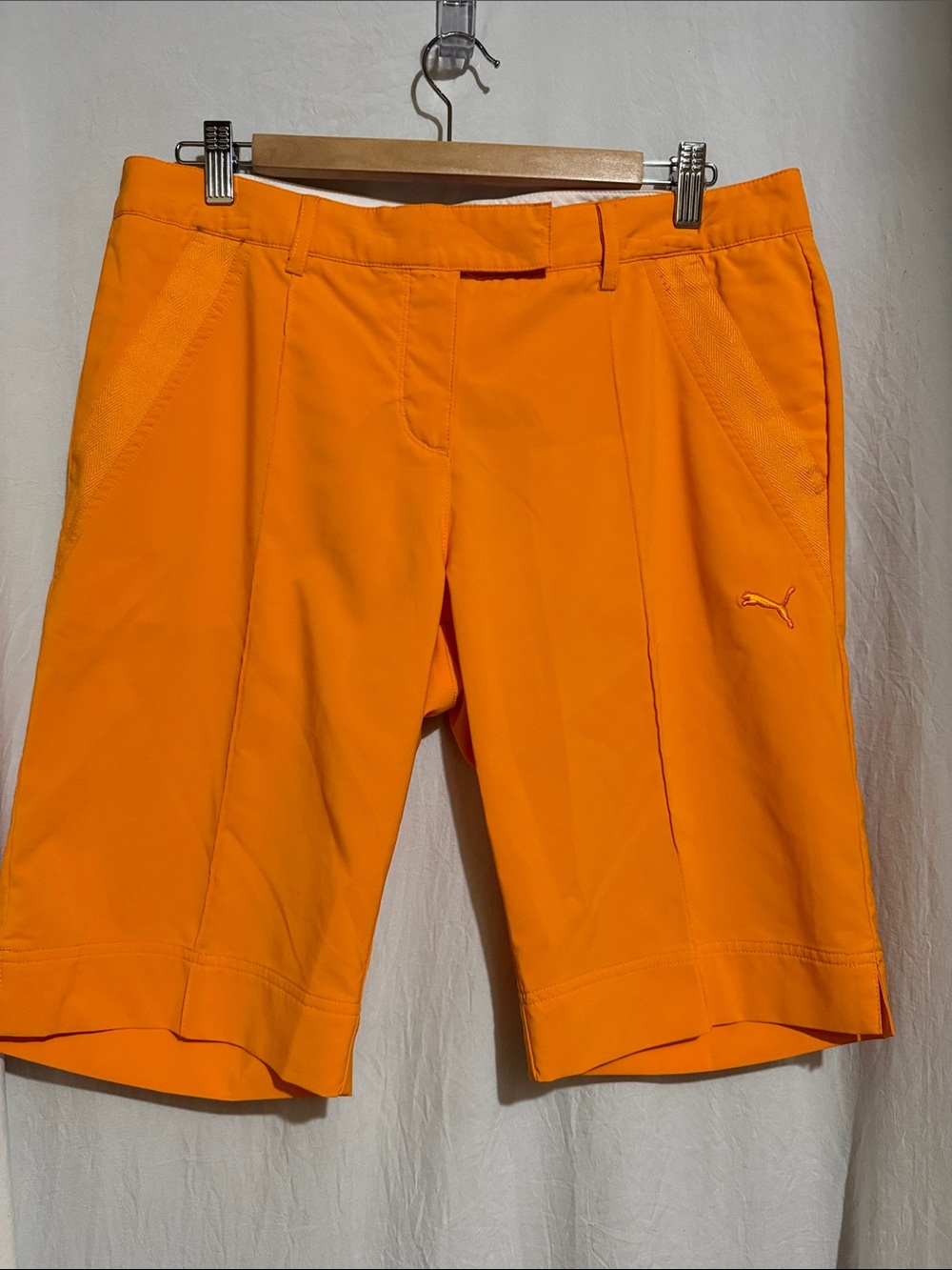 Puma Women's Bright Orange Performance air dry golf shorts size 10 with 11 insea
